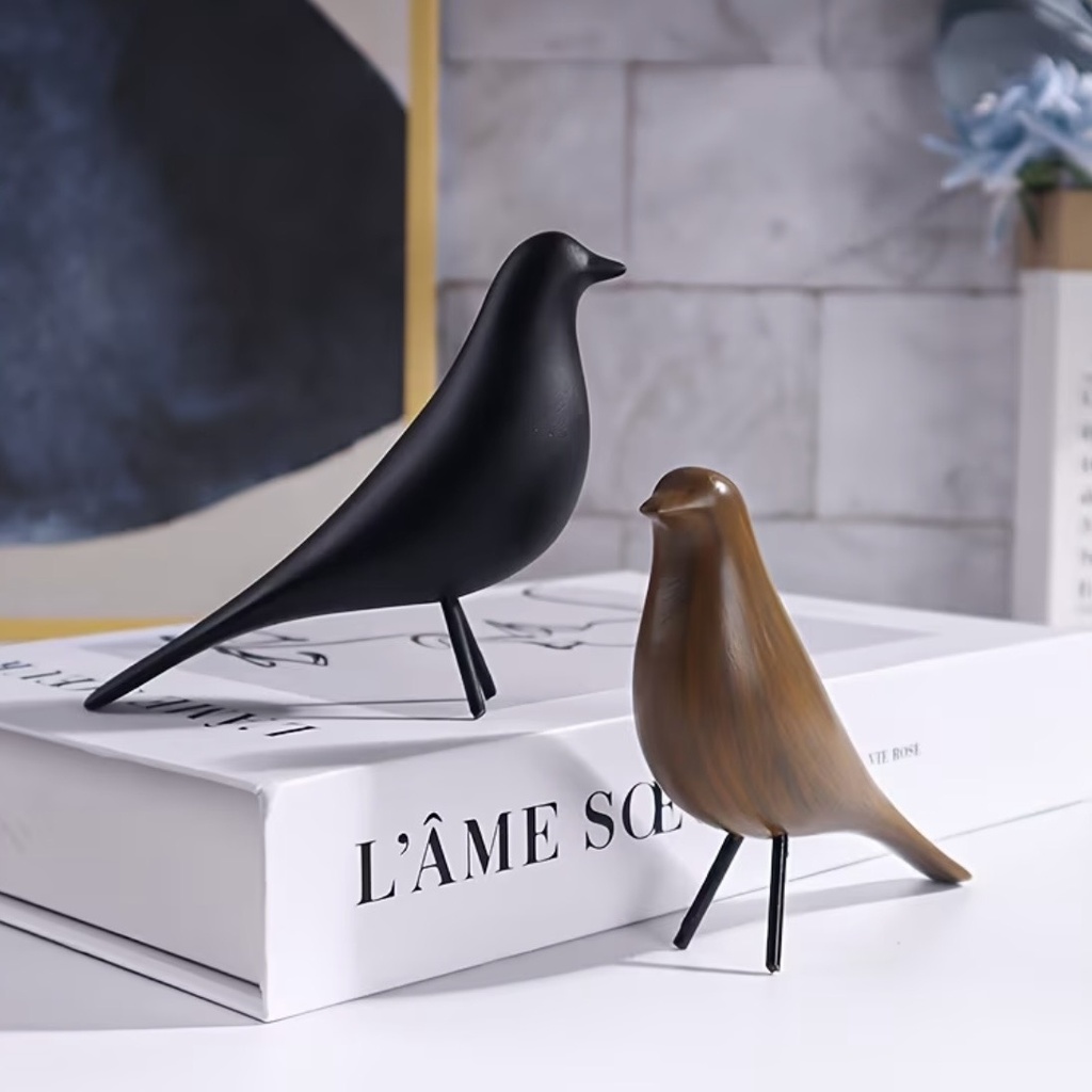 [00026] Pájaro negro minimalista